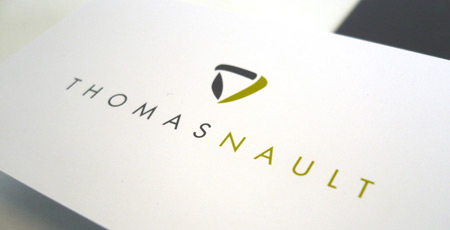 Tomam Nault Logo